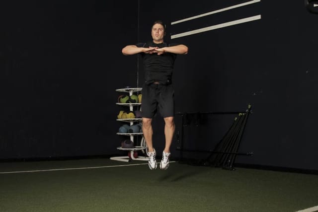 Knee Tuck Jump, finish position